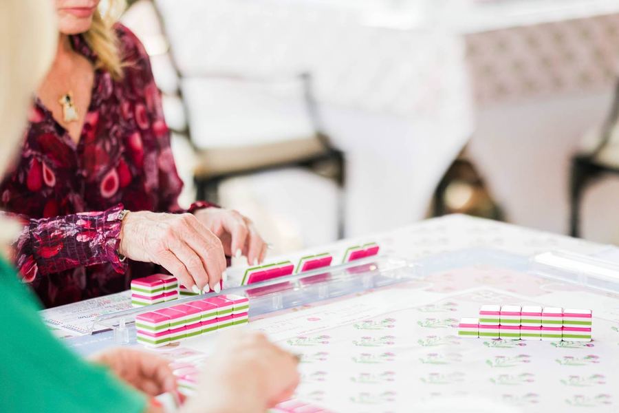 Close-up of pink and green tiles on a rack